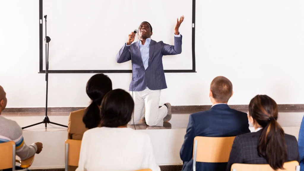 A speaker addressing an attentive audience